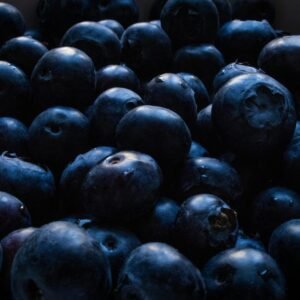 A detailed close-up of fresh blueberries showcasing their rich color and texture.